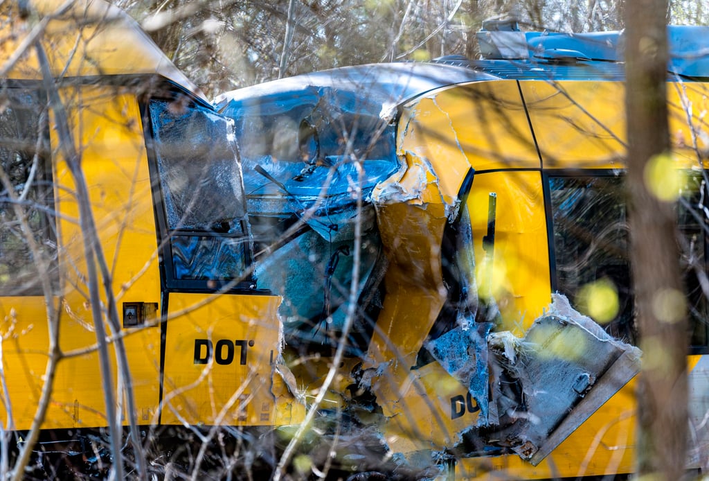 The front of the trains were smashed, though both remained upright on the tracks. Photo: EPA The front of the trains were smashed, though both remained upright on the tracks. Photo: EPA